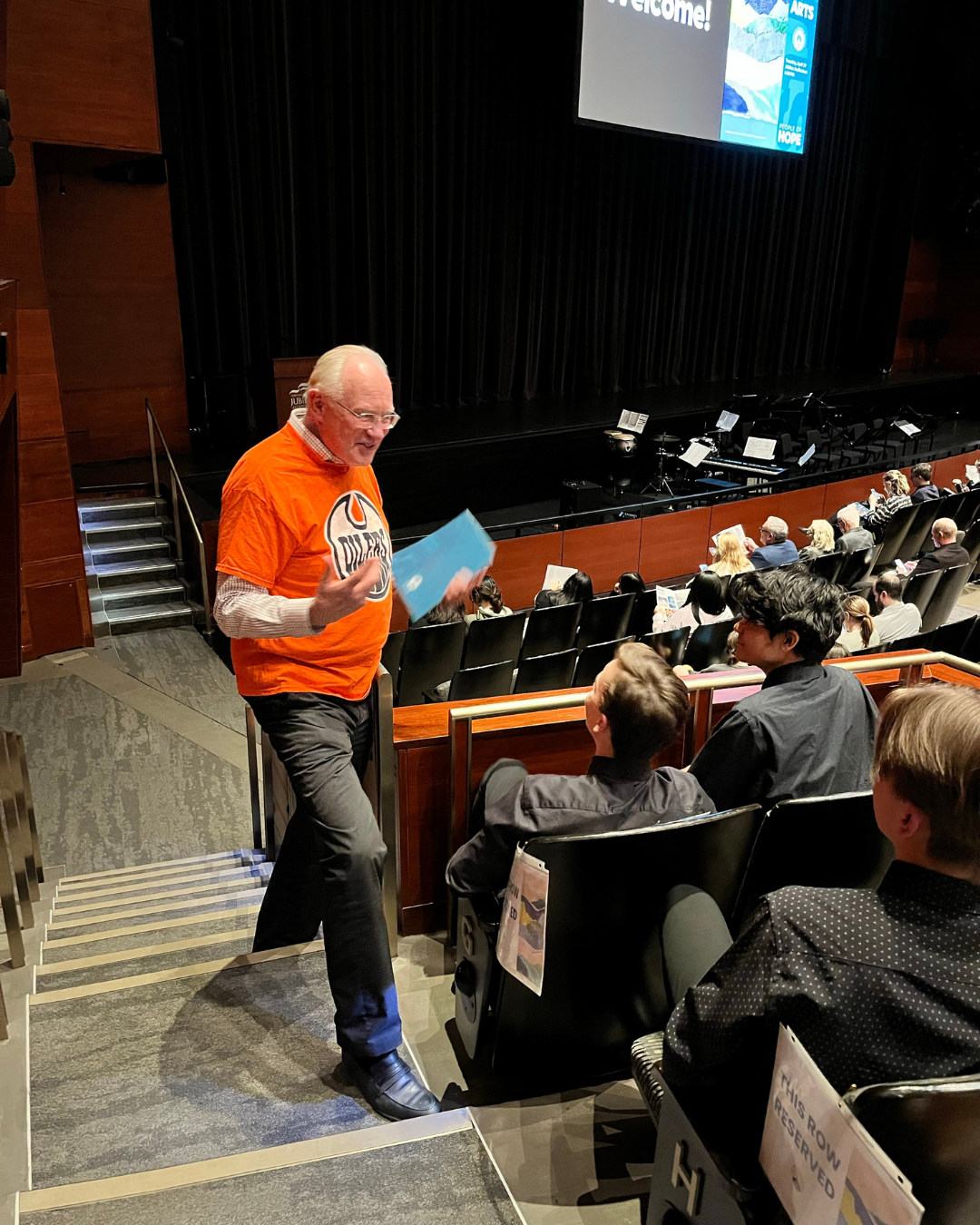 Trustee Harris speaking to student performers at the Celebration of the Arts
