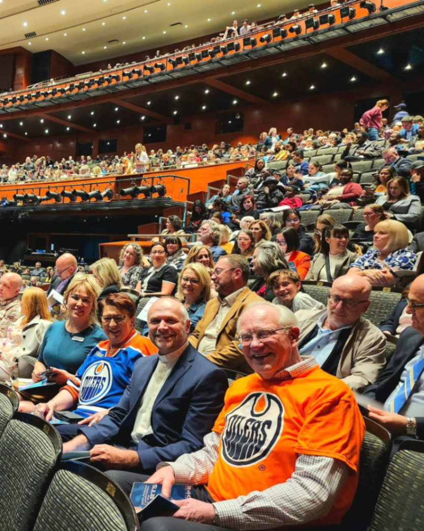 Trustees Terry Harris and Alene Mutula with Father Julian at the Celebration of the Arts 