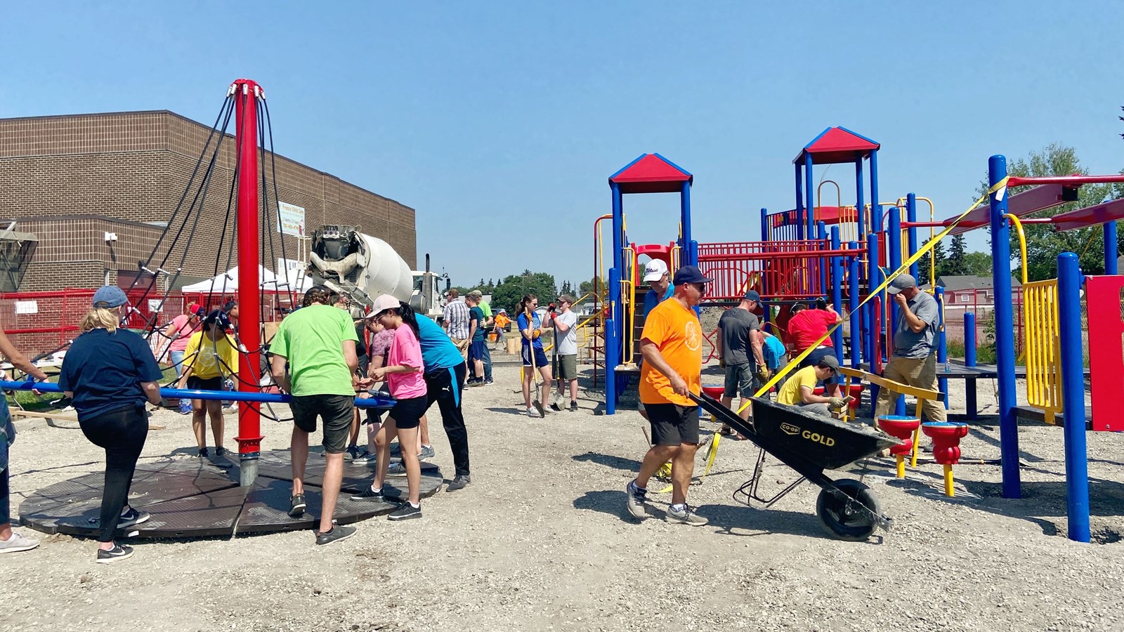 Volunteer playground build for St. Francis of Assisi Catholic Elementary School