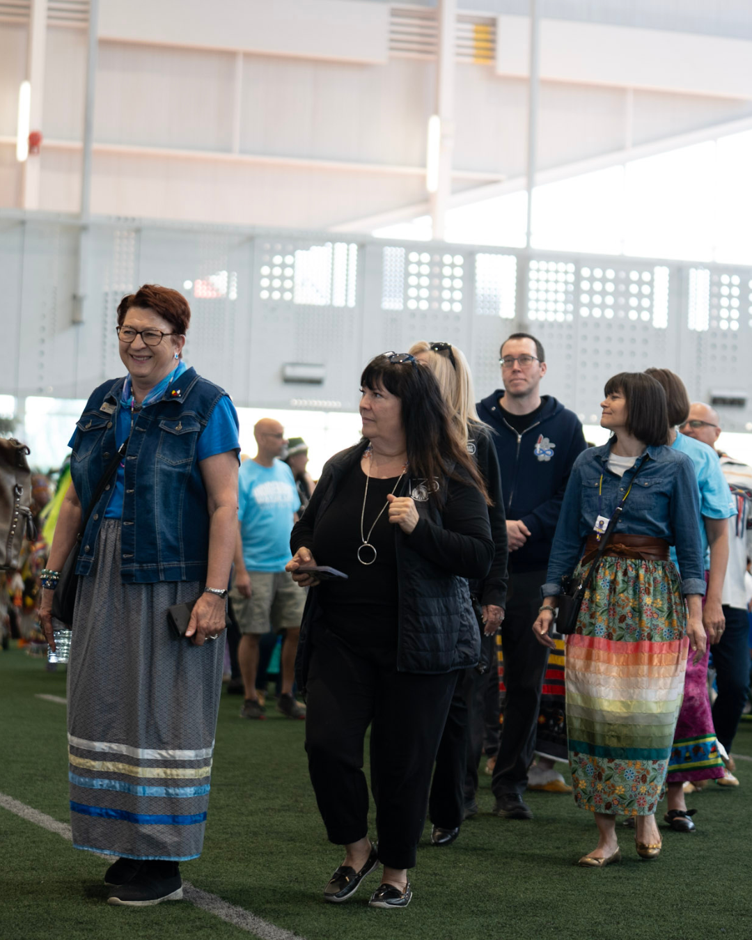 Trustees in a line at the Pow Wow Grand Entry