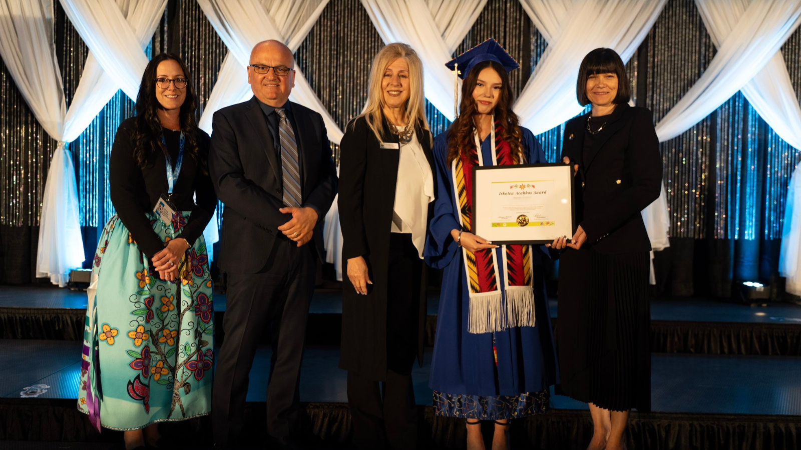 Lynnette Adnerson, Board Chair Sandra Palazzo , ECSD Staff and a student at the Indigenous Learning Services Graduation
